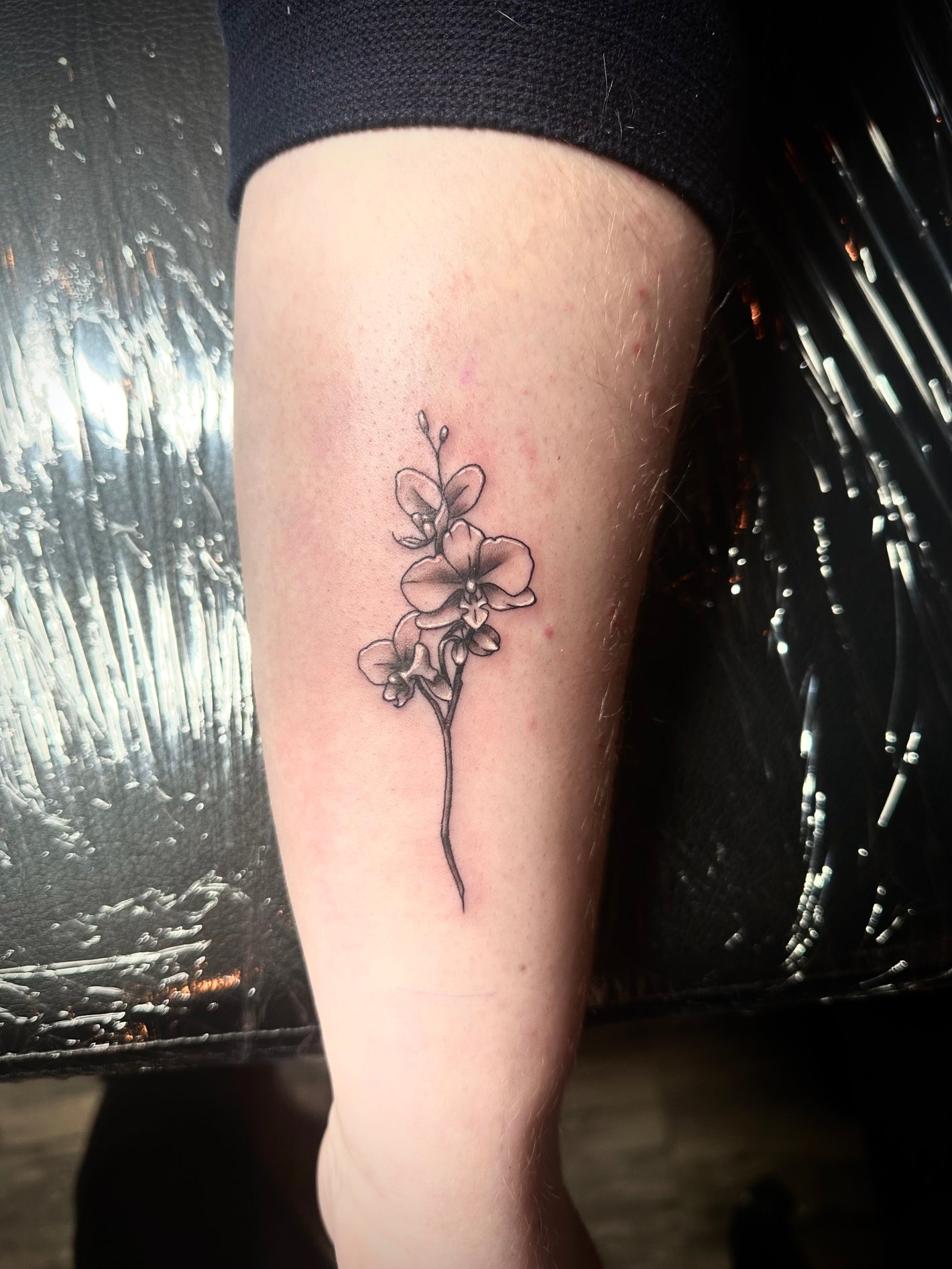 Fine line flower tattoo