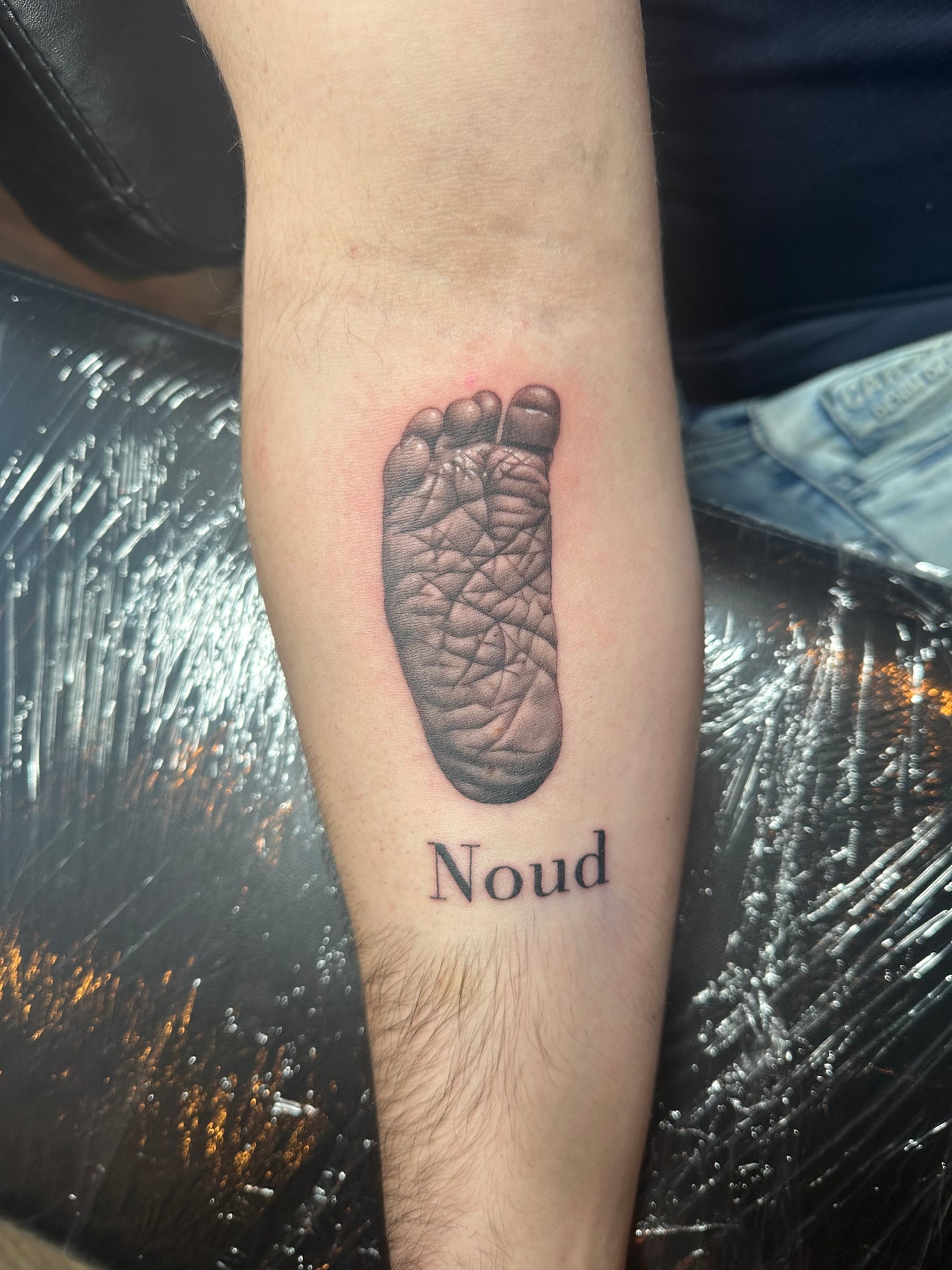 Realistisch baby voet tattoo