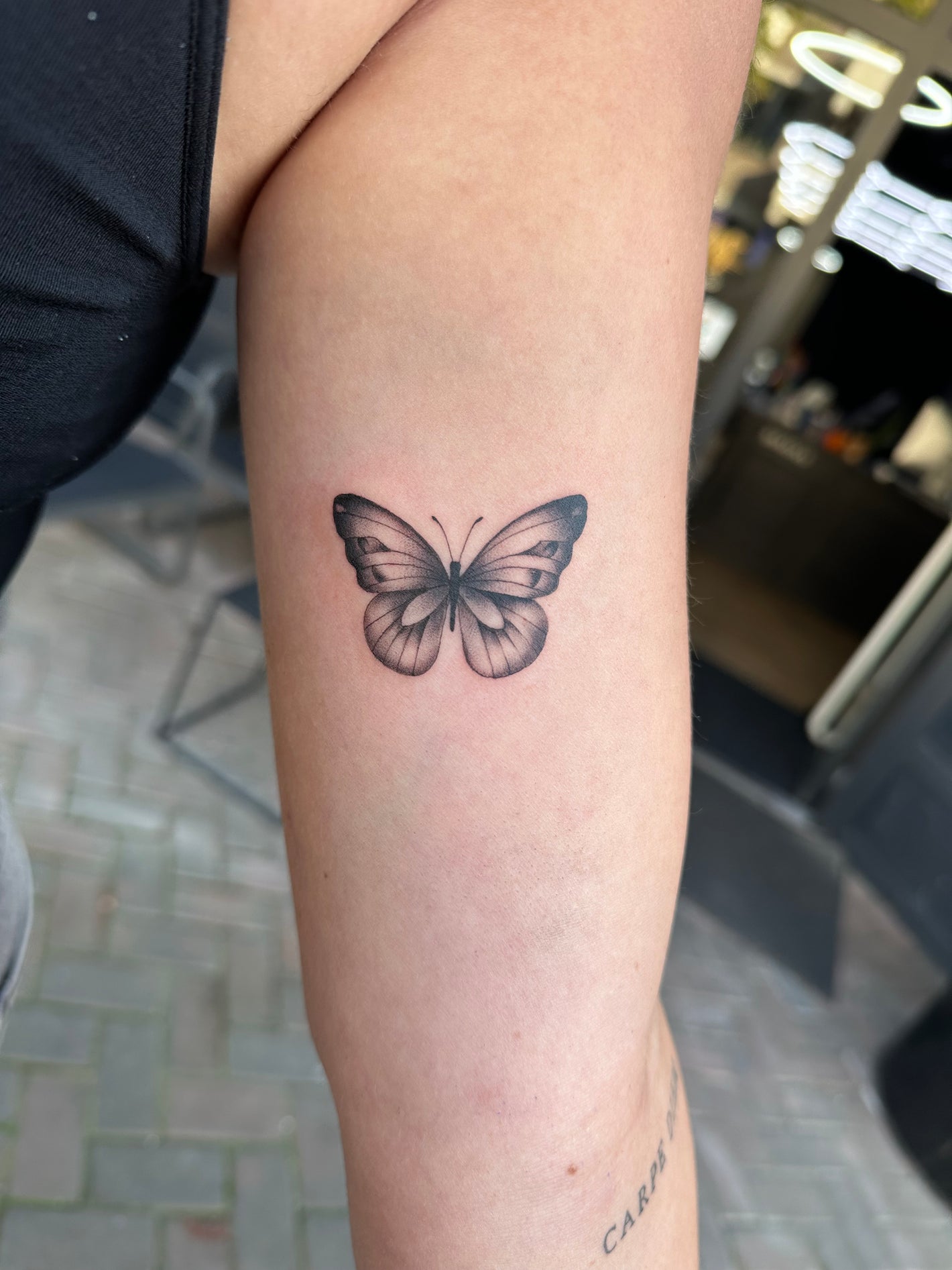 Vlinder tattoo 